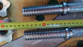 Barras y mancuernas para gimnasio