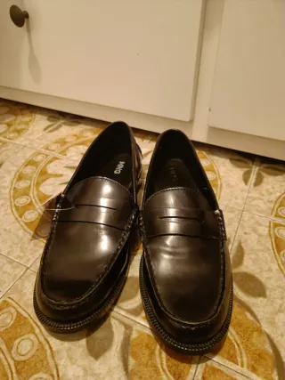 Mocasines antifaz negros.