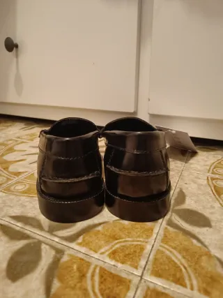 Mocasines antifaz negros.