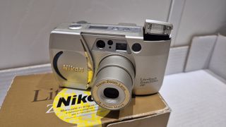 NIKON LITE TOUCH ZOOM 70WS - FLASH RIMANE ALZATO