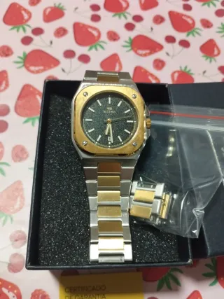 Reloj Bestwin Oro y Plata negociable