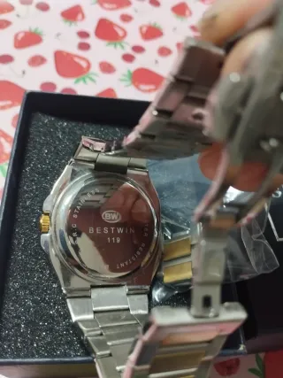 Reloj Bestwin Oro y Plata negociable