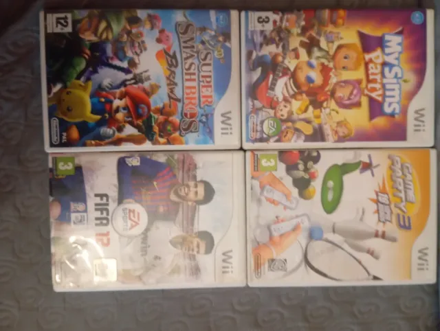 4 Juegos Wii: Super Smash Bros, FIFA 12, MySims Pa