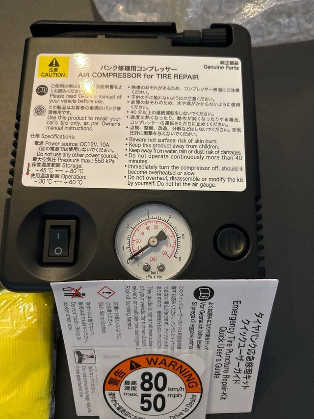 Baliza V16 y compresor aire coche