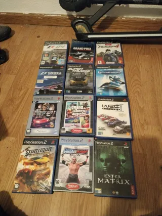 Consola PlayStation 2 con mandos y cables