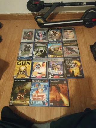 Consola PlayStation 2 con mandos y cables