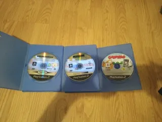 Consola PlayStation 2 con mandos y cables