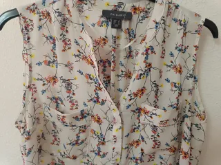 Camisa sin mangas Primark flores