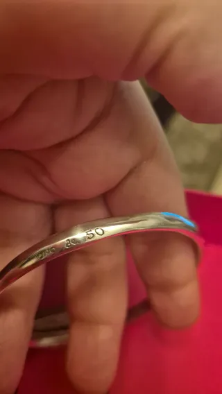 Pulsera Uno de 50 dorada con candado