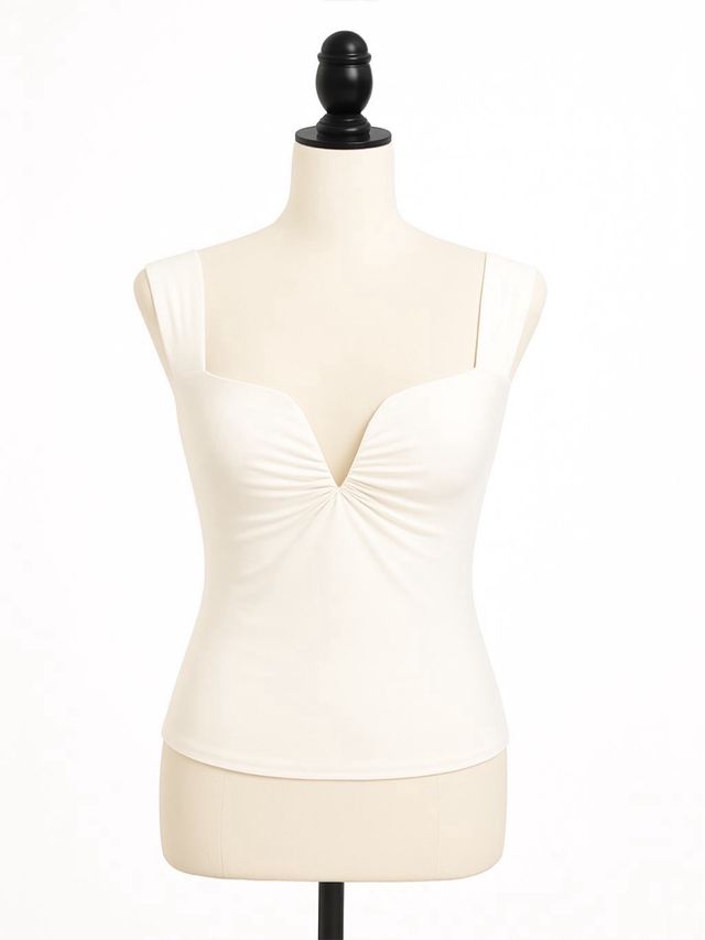 Top blanco fruncido escote pico