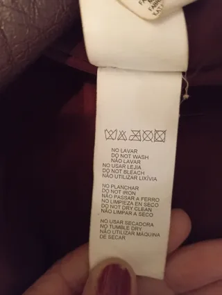 Chaqueta de piel marrón oscuro burdeos