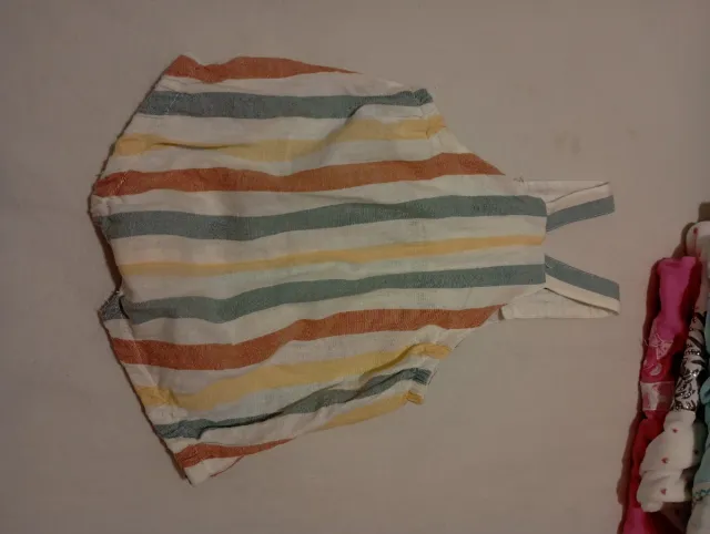 Body de bebé floral con rebeca tejida