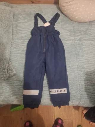 Mono de nieve azul con cremallera