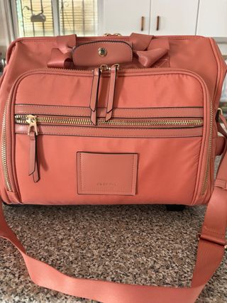 Maleta de mano Parfois rosa y dorada