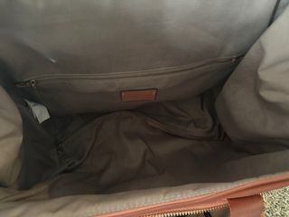 Maleta de mano Parfois rosa y dorada