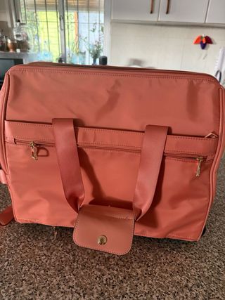 Maleta de mano Parfois rosa y dorada