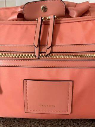 Maleta de mano Parfois rosa y dorada