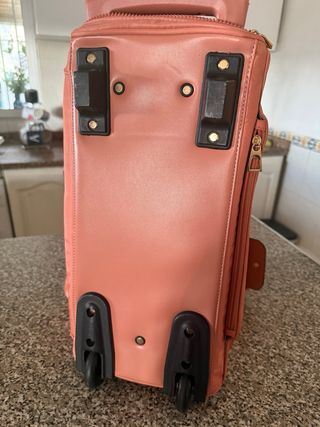 Maleta de mano Parfois rosa y dorada