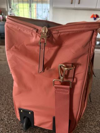 Maleta de mano Parfois rosa y dorada