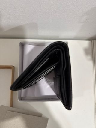 Cartera de piel negra para hombre