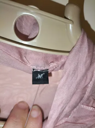 Blusa sin mangas con volantes y lazo