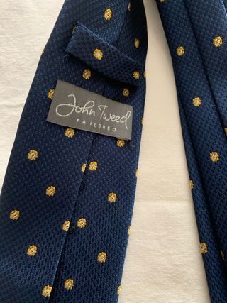 Corbata John Tweed azul con topos dorados