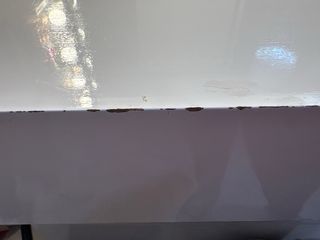 Tocador de maquillaje pared blanco