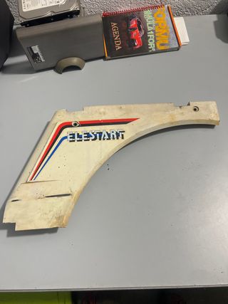 Chapa lateral Vespino XE Elestart Izquierda