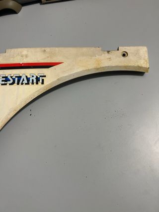 Chapa lateral Vespino XE Elestart Izquierda