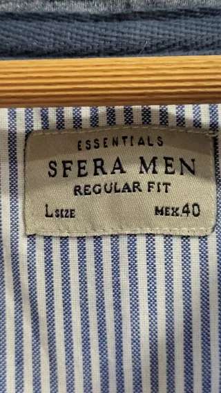 Chaqueta gris con cremallera