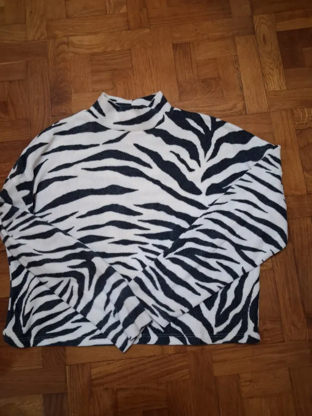 Jersey cuello alto estampado cebra