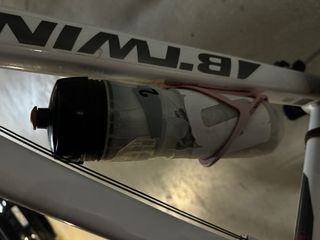 Bicicleta MTB B'TWIN blanca y rosa