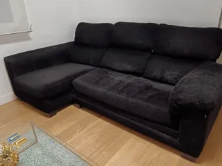 Sofá cama modular negro de tela.