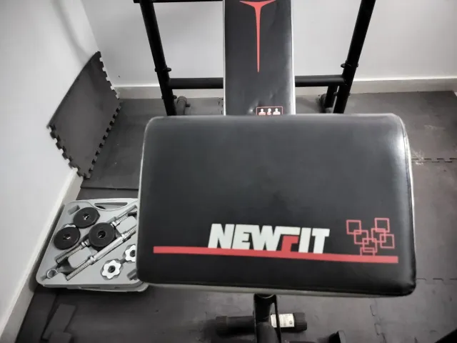 Banco de pesas + discos y mancuernas