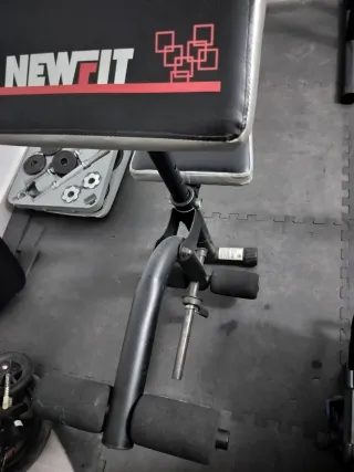 Banco de pesas + discos y mancuernas