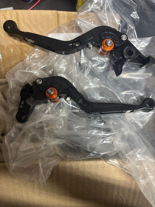 Manetas Moto Regulables Negro Naranja