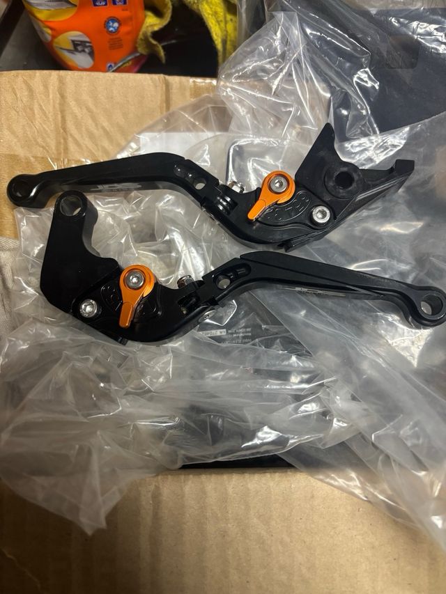 Manetas Moto Regulables Negro Naranja