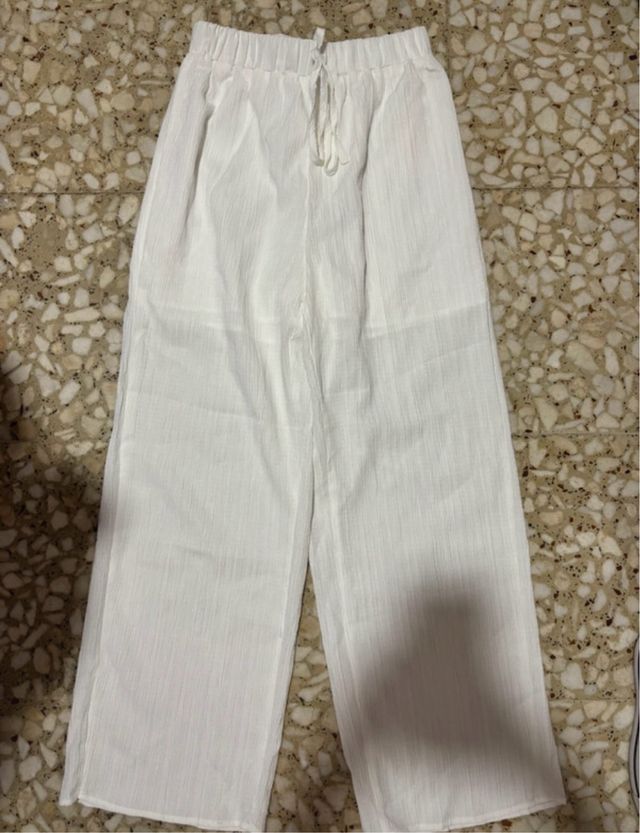 Pantalones anchos de lino blancos