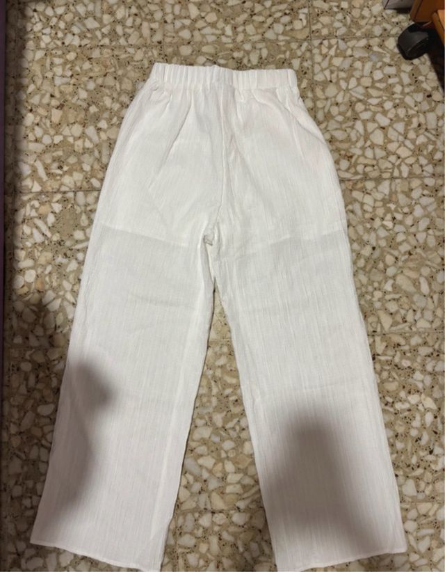 Pantalones anchos de lino blancos
