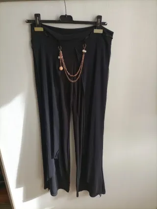 Pantaloni eleganti con drappi trasparenti