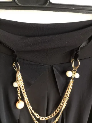 Pantaloni eleganti con drappi trasparenti