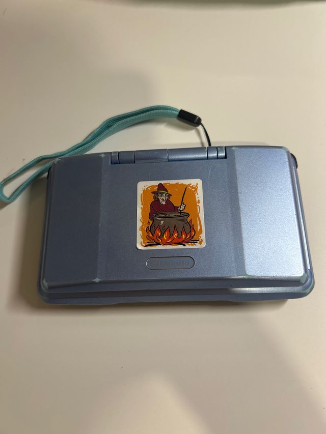 Nintendo DS azul con correa