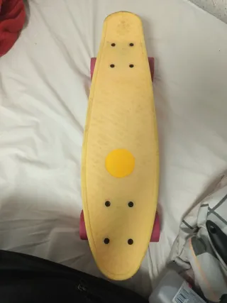 Patinete amarillo y rosa