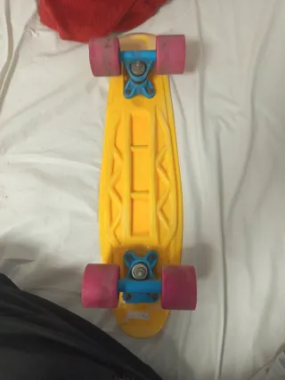 Patinete amarillo y rosa