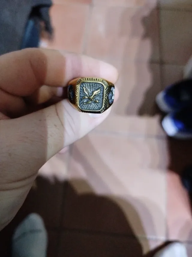 Sello de hombre acero dorado y plateado