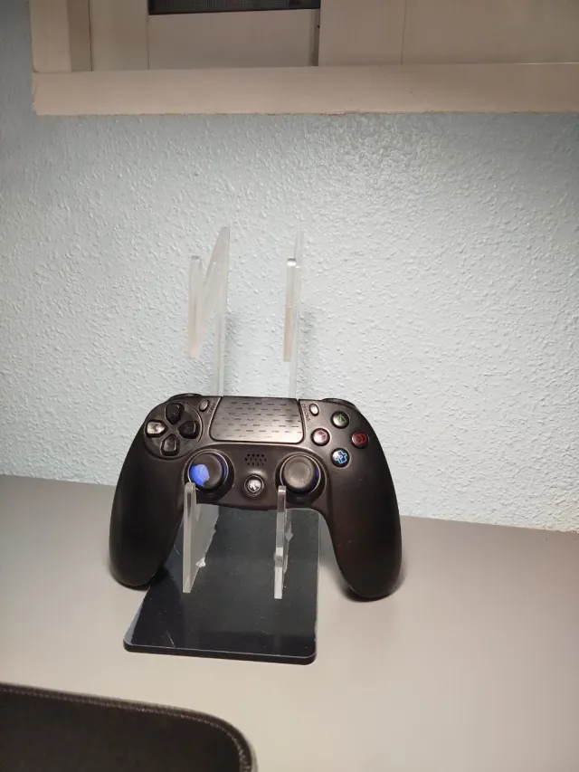 Soporte acrílico para mando de consola