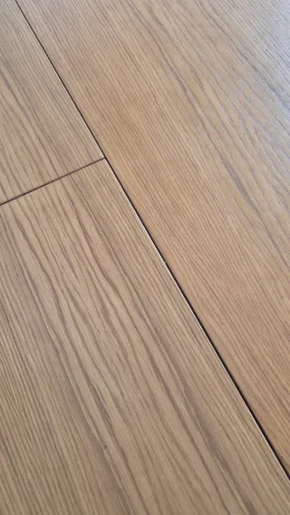 Mesa de comedor redonda y extensible de madera