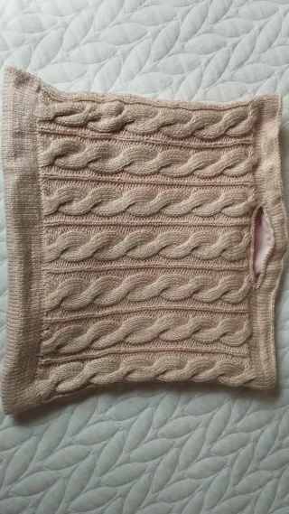 Bolso tejido rosa con trenzas