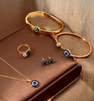 Conjunto Ojo Turco Dorado y Azul