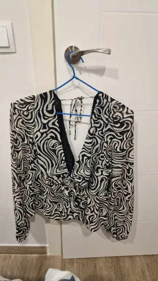 Blusa estampada cebra manga larga